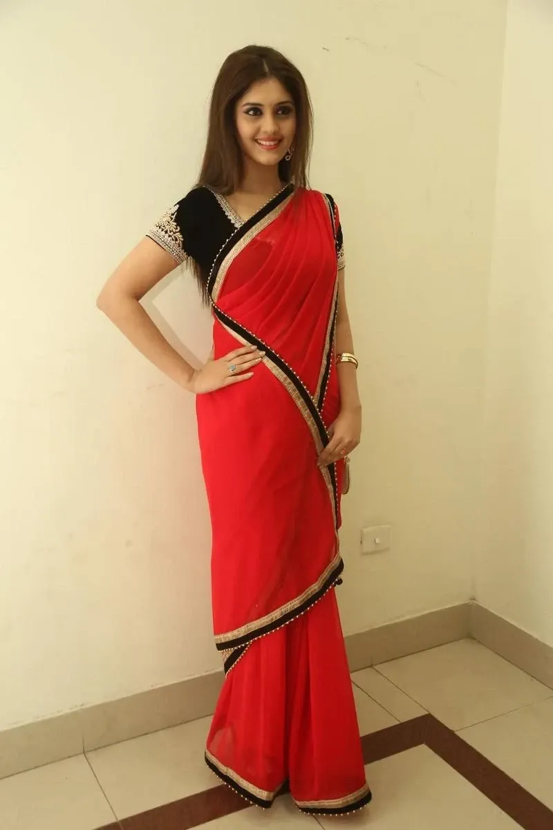 INDIAN ACTRESS SURABHI IMAGES IN TRADITIONAL RED SAREE 3